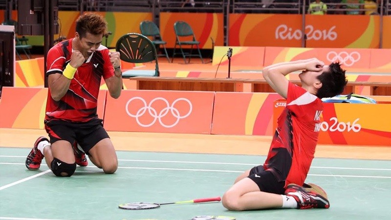Ekspresi Liliyana Natsir dan Tontowi Ahmad saat memastikan medali emas Olimpiade di Rio 2016.