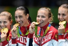 Kenapa Atlet Pemenang Olimpiade Suka Menggigit Medali Emas?
